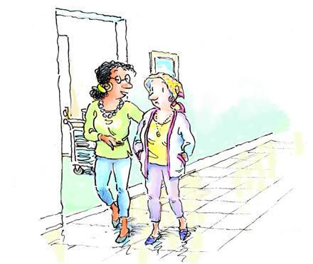 Women walking with arm around patient